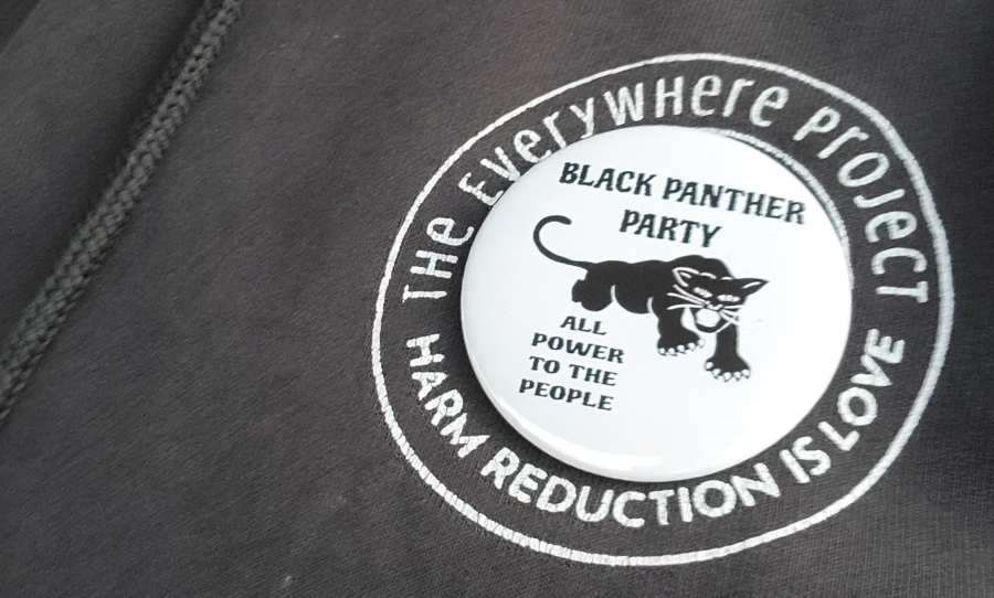 A hoodie with the logos of the original Black Panther Party and the harm reduction organisation The Everywhere Project